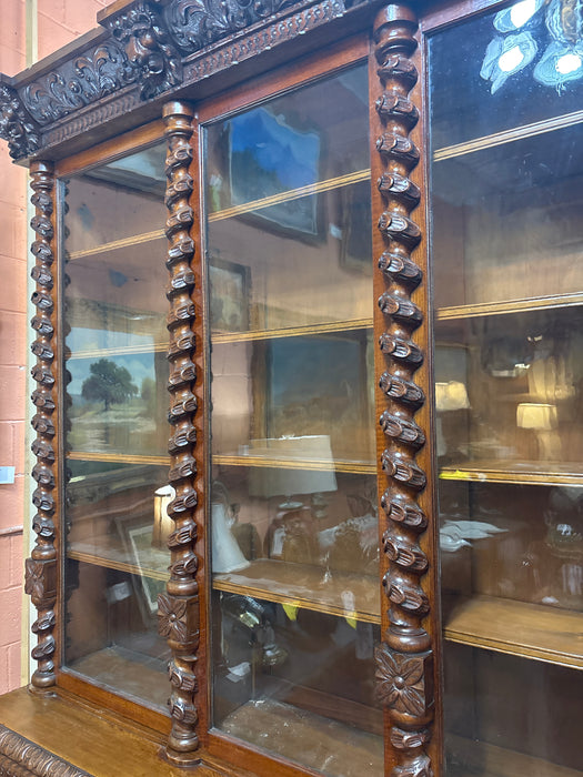 HUGE STEPBACK 4 DOOR CARVED PORTRAIT HEAD BOOKCASE WITH FOLIATE TWIST COLUMNS