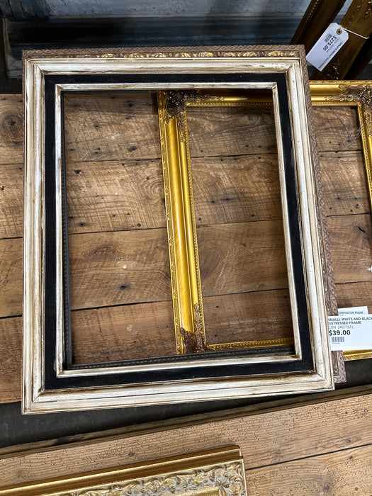 SMALLL WHITE AND BLACK DISTRESSED FRAME