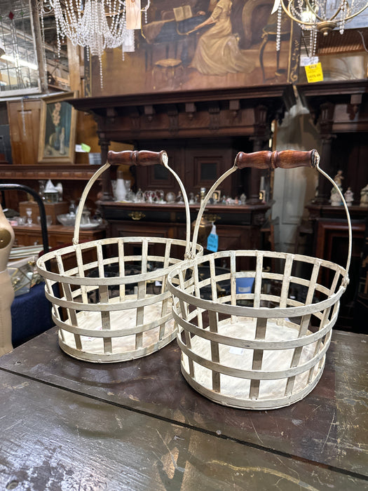 PAIR OF METAL BASKETS WITH WOOD HANDLE