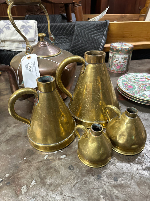 SET OF 4 GRADUATED BRASS MEASURES