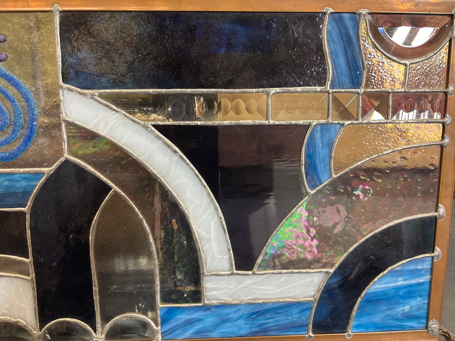 SMALL BLUE AND PURPLE STAINED GLASS WINDOW WITH HAND