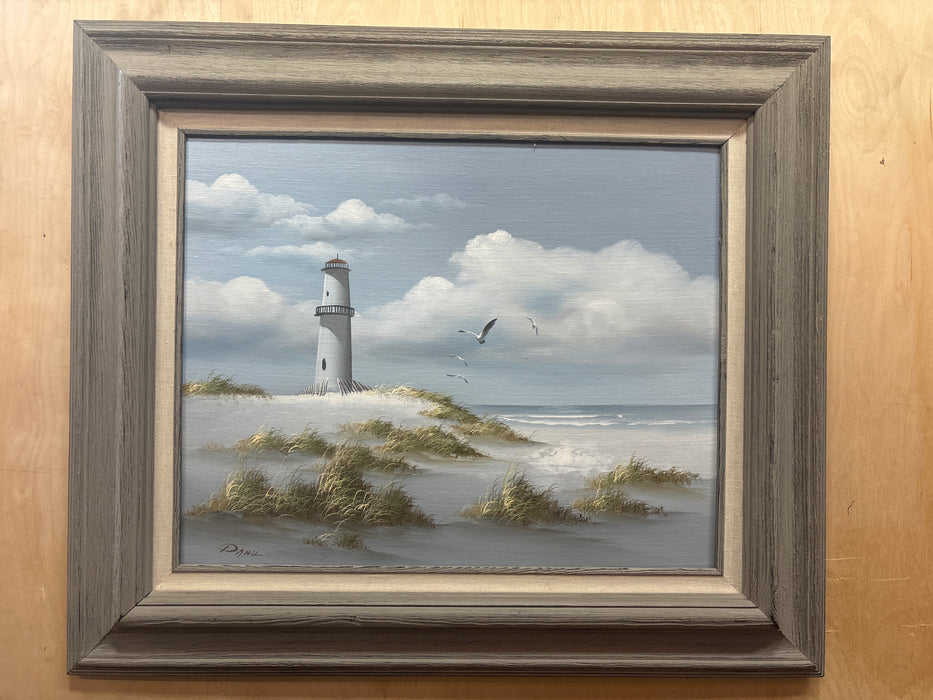 MEDIUM GRAY FRAMED LIGHTHOUSE OIL PAINTING - SIGNED DANIL