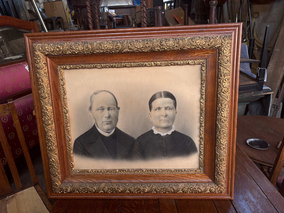 ORNATE FRAMED PHOTO OF MAN AND WOMAN