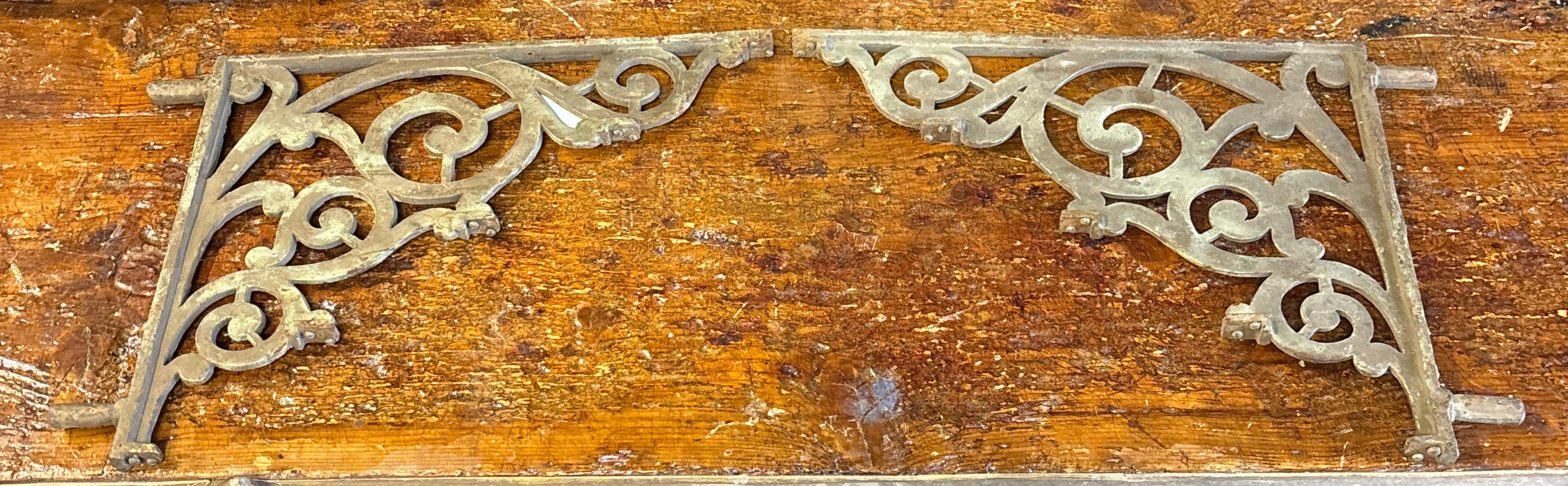 PAIR OF GOLD IRON WALL SHELF BRACKETS