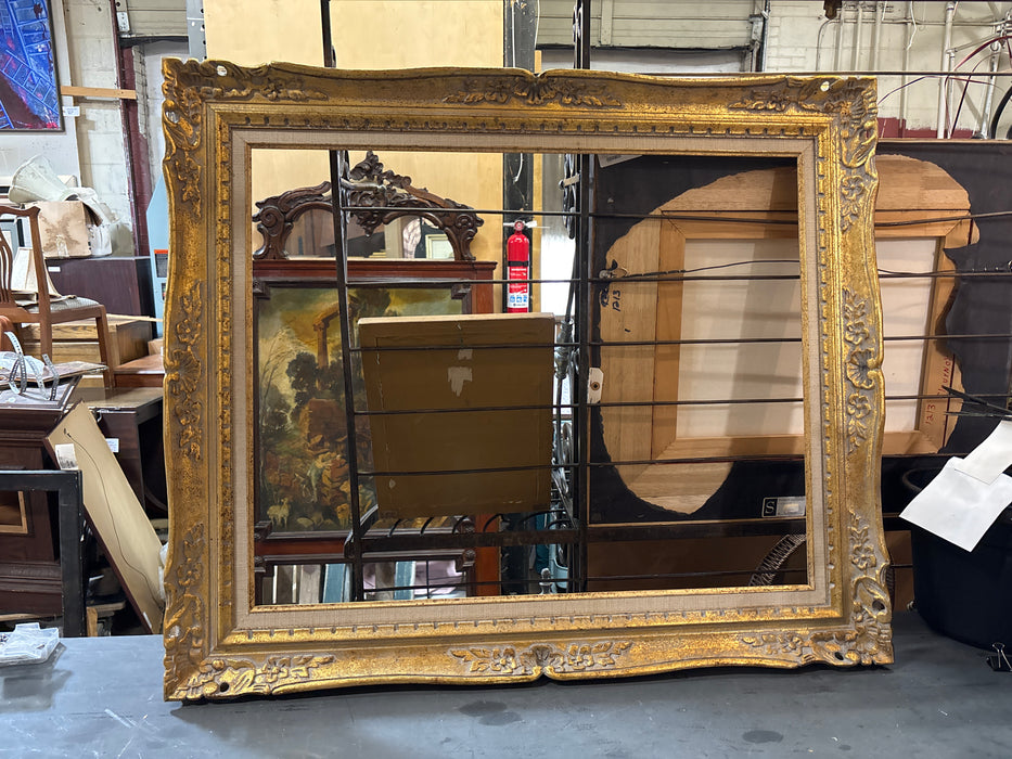 ORNATE WHITE WASHED GILT FRAME WITH LINEN FILET
