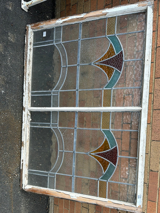 DOUBLE PANELED STAINED GLASS WINDOW WITH BLUE ARCH