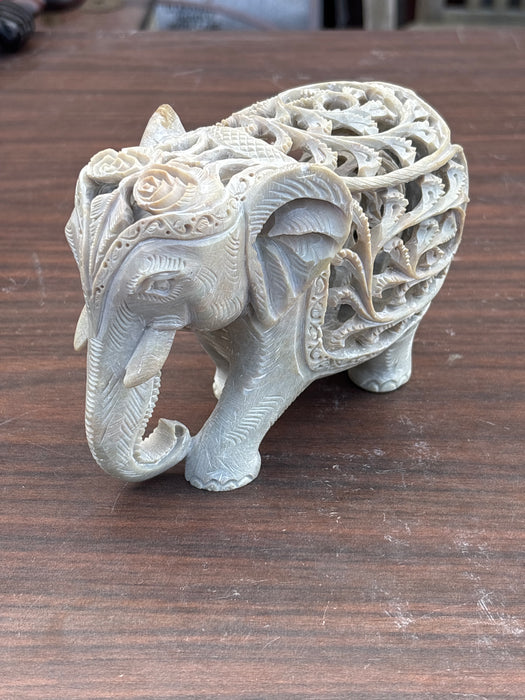 LARGE CARVED SOAPSTONE ELEPHANT WITH INNER ELEPHANT