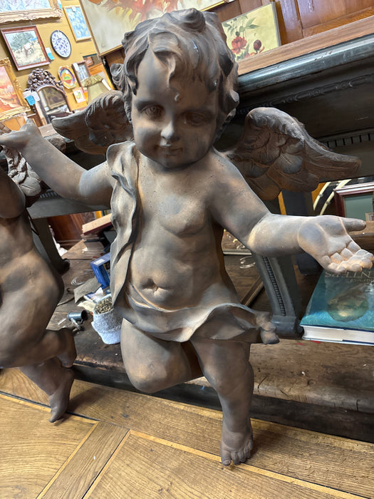 PAIR OF LARGE COMPOSITION CUPIDS