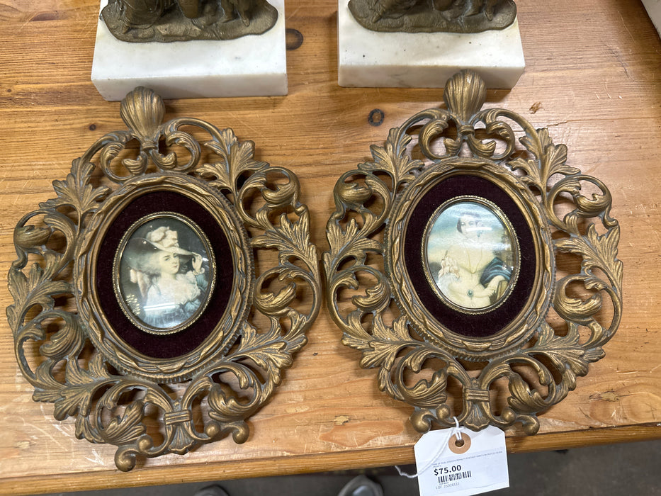 PAIR OF OVAL MODERN ROYALTY PORTRAIT PRINTS IN PIERCED RESIN FRAMES