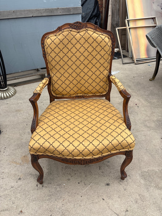 FLORAL CARVED UPHOLSTERED MAHOGANY ARM CHAIR