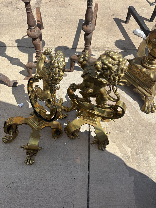 PAIR OF SMALL BRASS LION ANDIRONS WITH PAW FEET