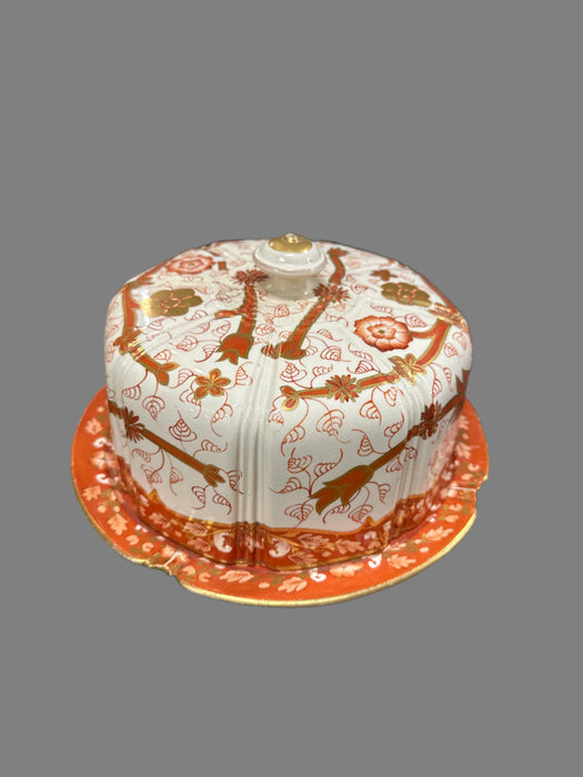 ORANGE AND WHITE COVERED DISH