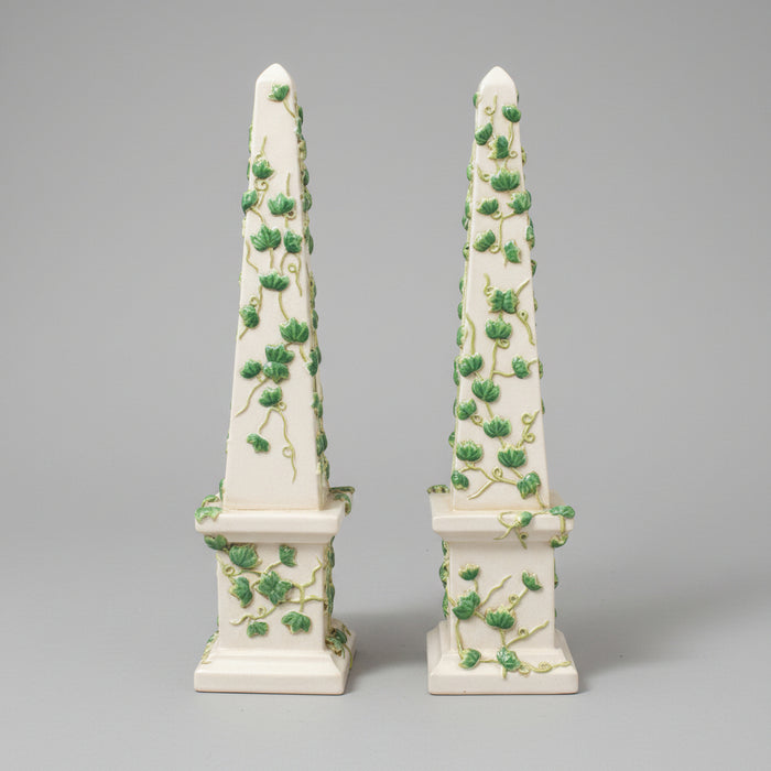 PAIR OF GREEN AND WHITE OBELISKS