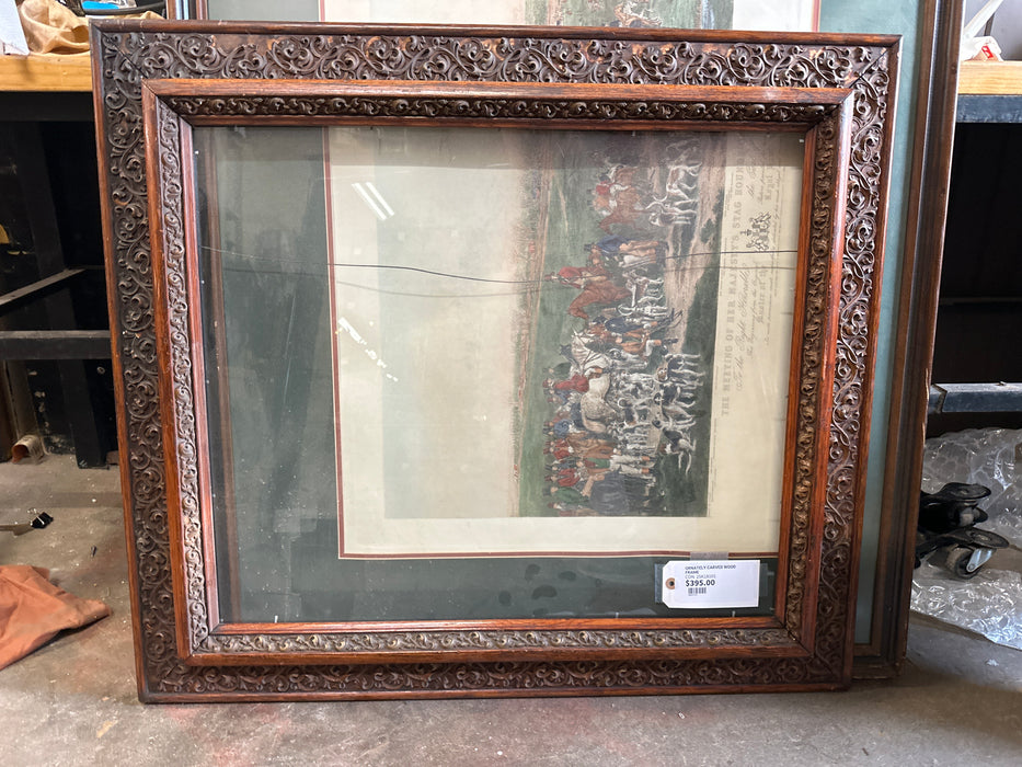 ORNATELY CARVED WOOD FRAME
