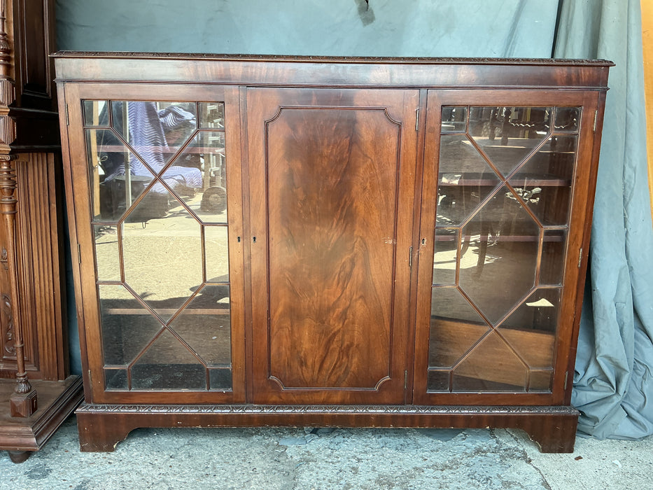 LOW MAHOGANY MULLIONED 3 DOOR BOOK CASE