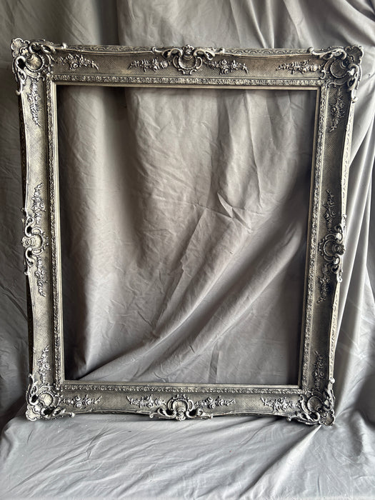 LARGE ORNATE SILVER FRAME