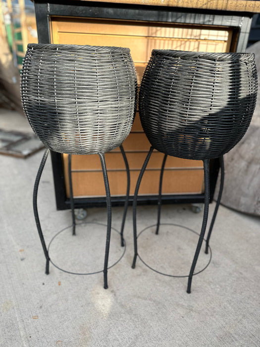 PAIR OF BLACK RATTAN PLANTERS