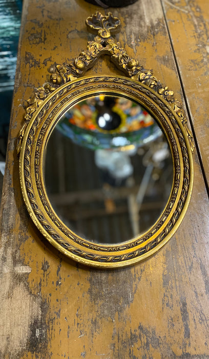 SMALL OVOID GOLD GESSO AND WOOD FRENCH MIRROR