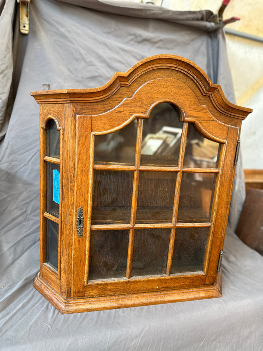 HANGING ARCHED OAK CABINET WITH  PANED GLASS