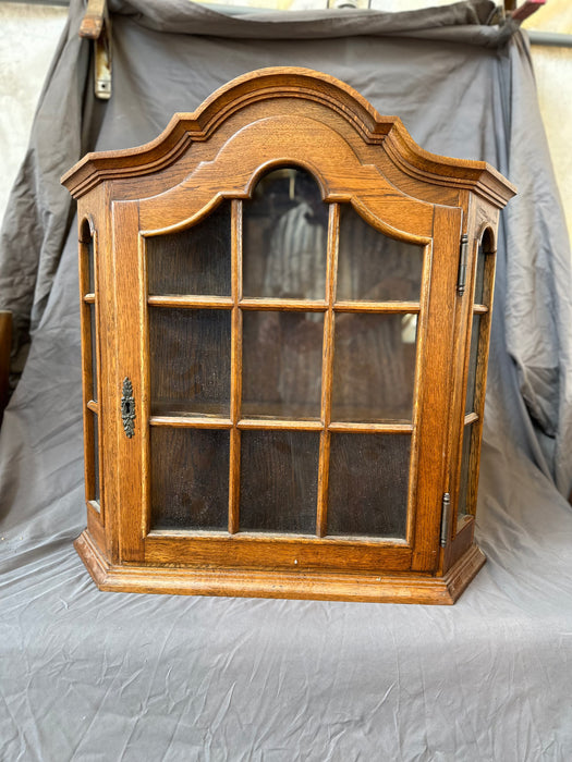 HANGING ARCHED OAK CABINET WITH  PANED GLASS