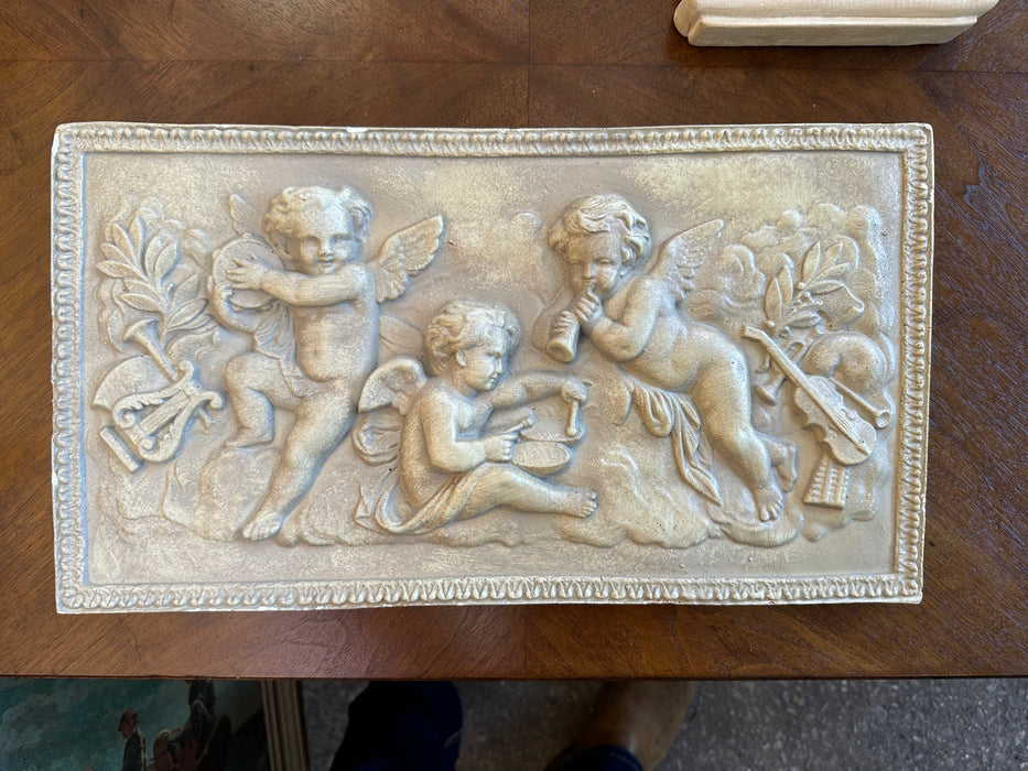 PLASTER PUTTI PLAQUE