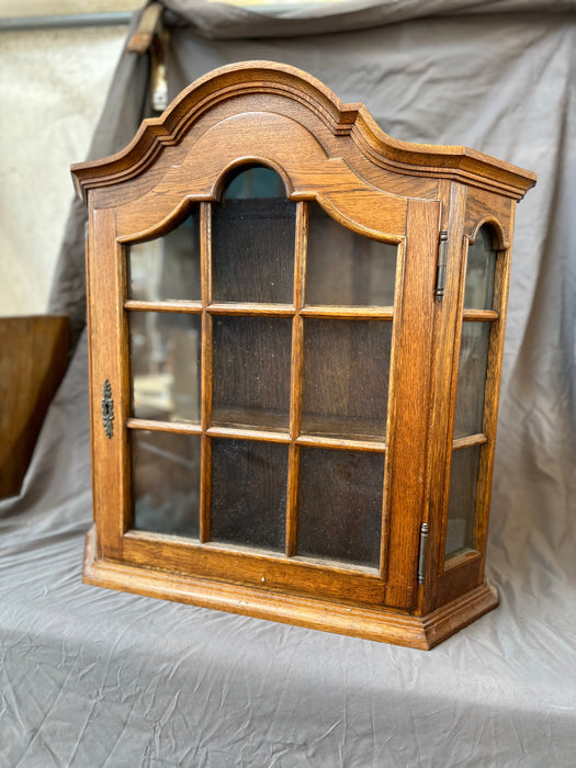 HANGING ARCHED OAK CABINET WITH  PANED GLASS