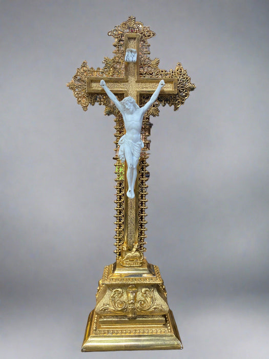 BRASS AND WOOD GILT CRUCIFIX WITH BISQUE CORPUS