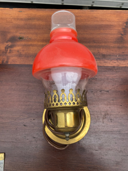 BRASS WALL SCONCE WITH ORANGE GLASS SHADE