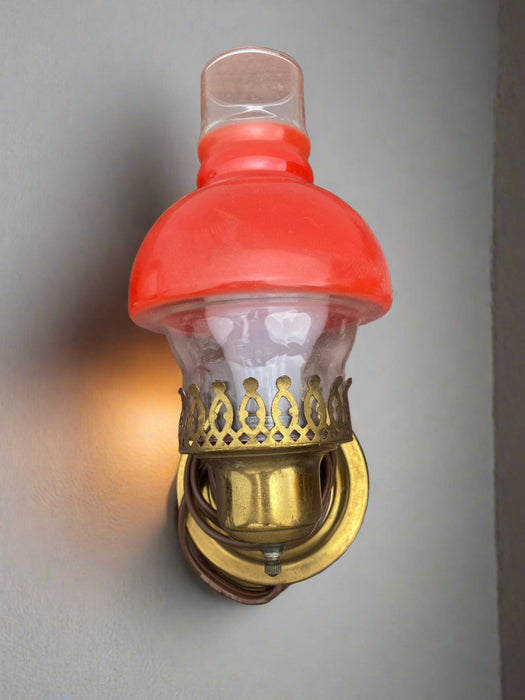 BRASS WALL SCONCE WITH ORANGE GLASS SHADE