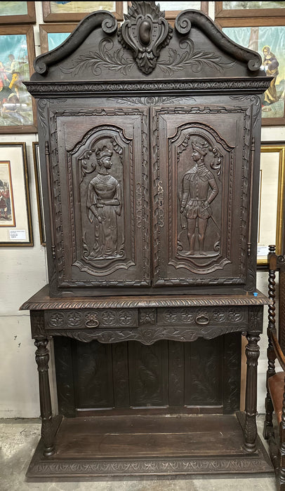 NOBILITY CARVED OAK CABINET ON STAND
