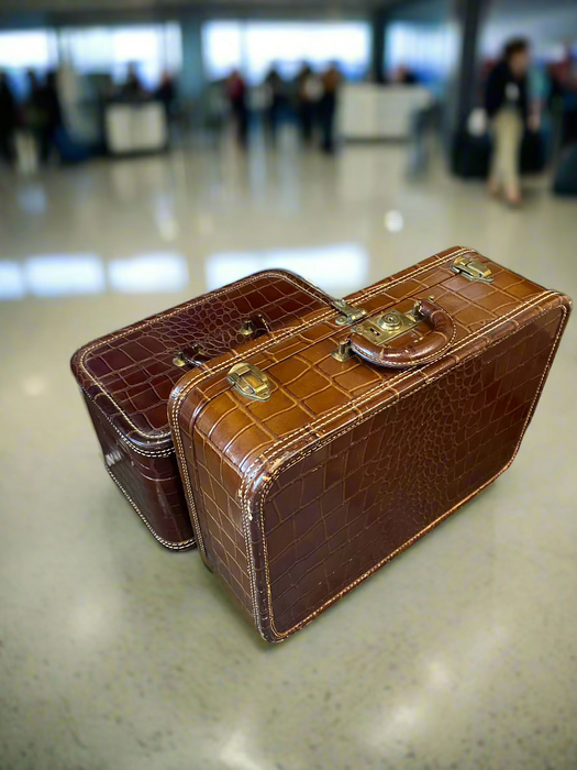 TWO PIECES OF LEATHER LUGGAGE