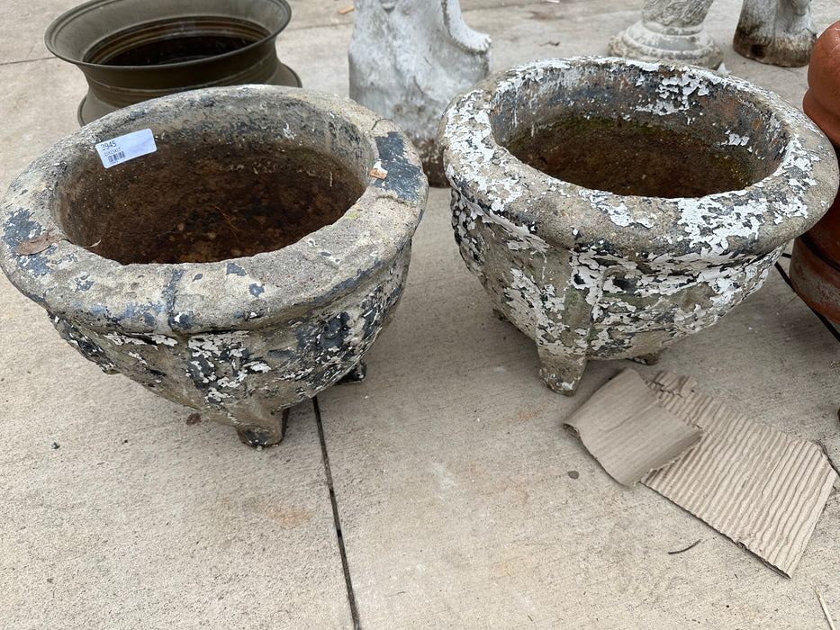 PAIR OF OLD ROUND CONCRETE FOOTED PLANTERS
