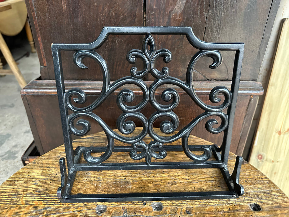 SMALL CAST IRON BOOK STAND