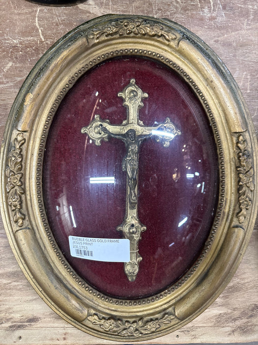 GOLD AND RED OVAL FRAMED CRUCIFIX