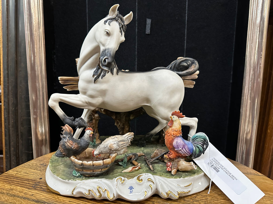 PORCELAIN STATUE WITH HORSES AND CHICKENS AS FOUND