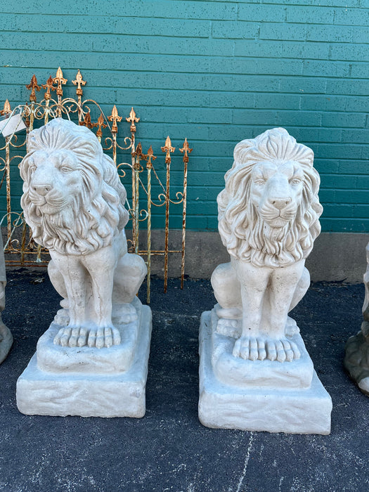 PAIR LION STATUES ON RUSTIC BASE