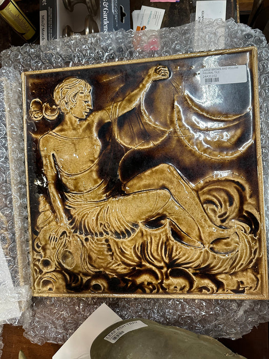 LARGE BROWN AND YELLOW FIGURAL TILE