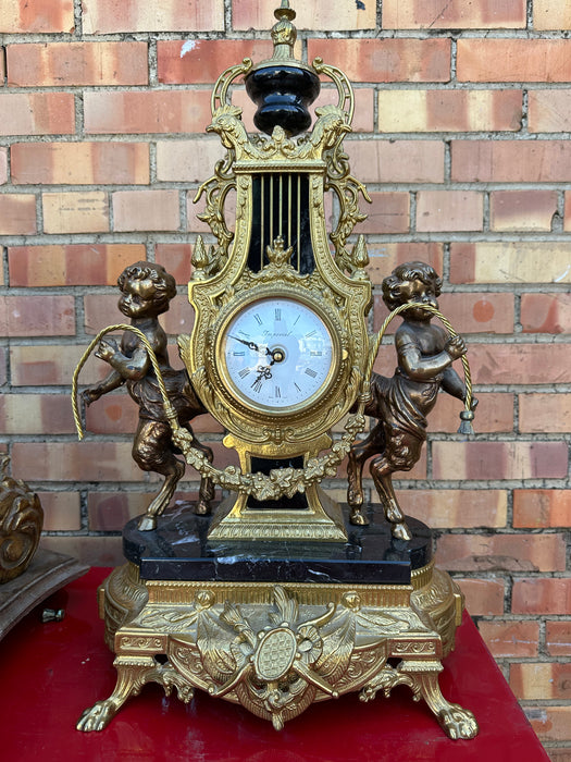 IMPERIAL FIGURAL CLOCK WITH BABY SATYRS FROM 1980S AS FOUND