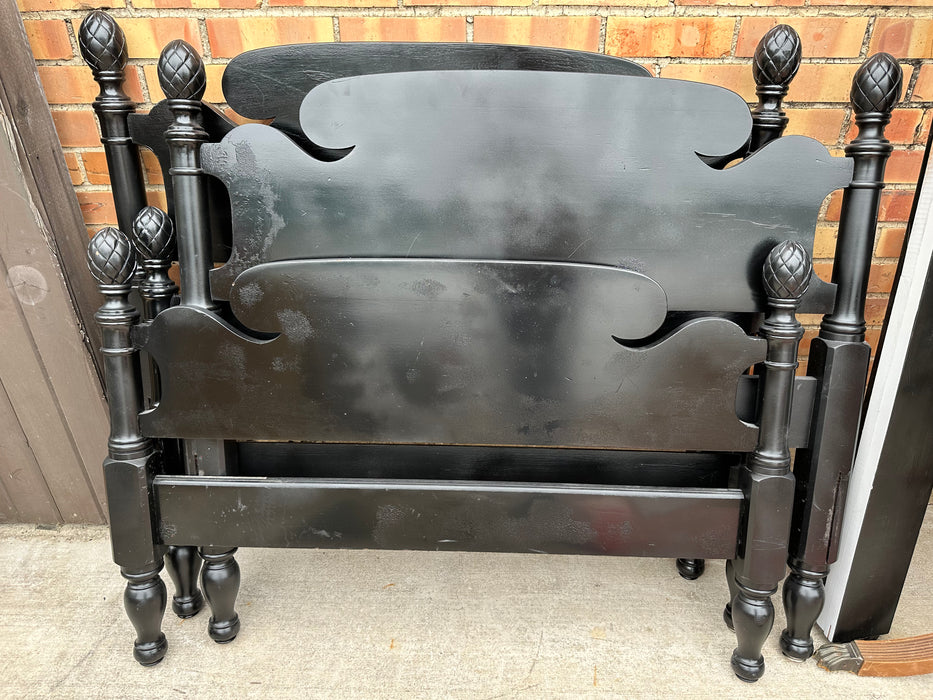 PAIR OF TWIN BLACK BEDS WITH PINEAPPLE FINIALS