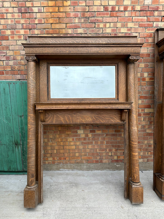 QUARTER SAWN OAK FIRE PLACE MANTLE WITH SHAPED BEVELED GLASS MIRROR AS FOUND