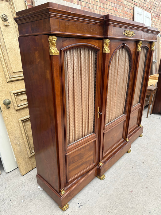 FRENCH EMPIRE MAHOGANY BOOKCASE WITH BRASS PAW FEET AND ORMOLU