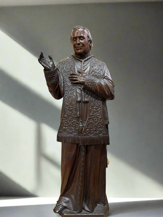 CARVED WOODEN STATUE OF A BISHOP