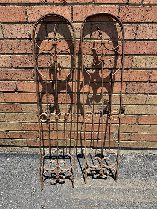 PAIR OF IRON ARCHED PANEL WITH SCROLLS