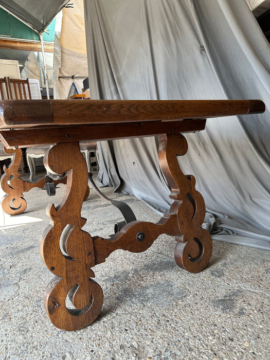 SPANISH STYLE OAK TABLE WITH IRON STRECTHER