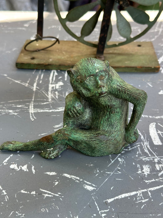 GREEN SITTING MONKEY