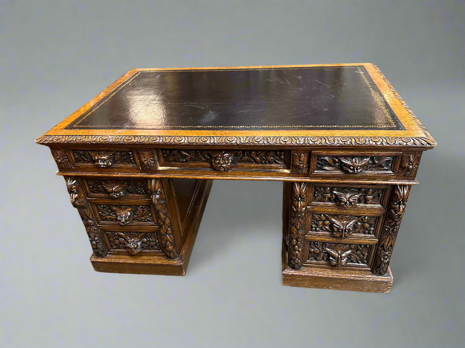 SMALL CARVED OAK PARTNERS DESK WITH BLACK LEATHER TOP