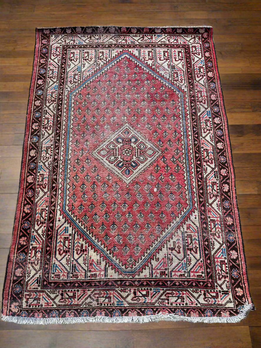 CORAL AND BROWN HAND WOVEN RUG AS FOUND