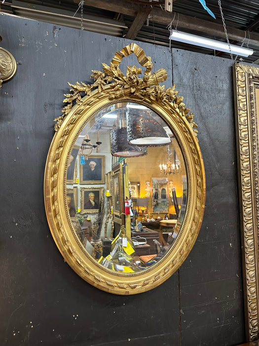 GILT LOUIS XVI OVAL MIRROR