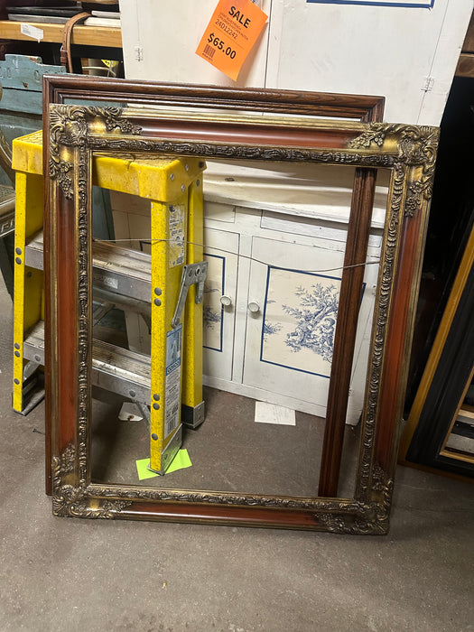 ORNATE WOOD FRAME WITH METAL CORNERS