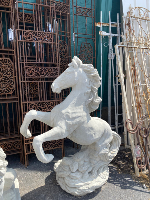 PAIR OF CONCRETE HORSES
